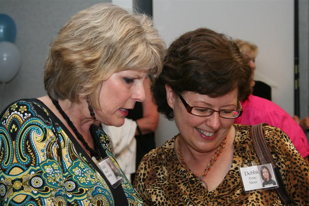 Nancy Ruoff and Debbie Petty sharing good memories at our 40th.